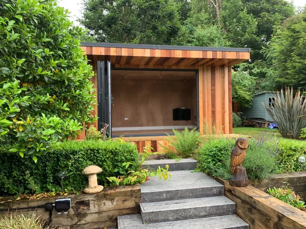 Garden bar with bi-folds and feature window